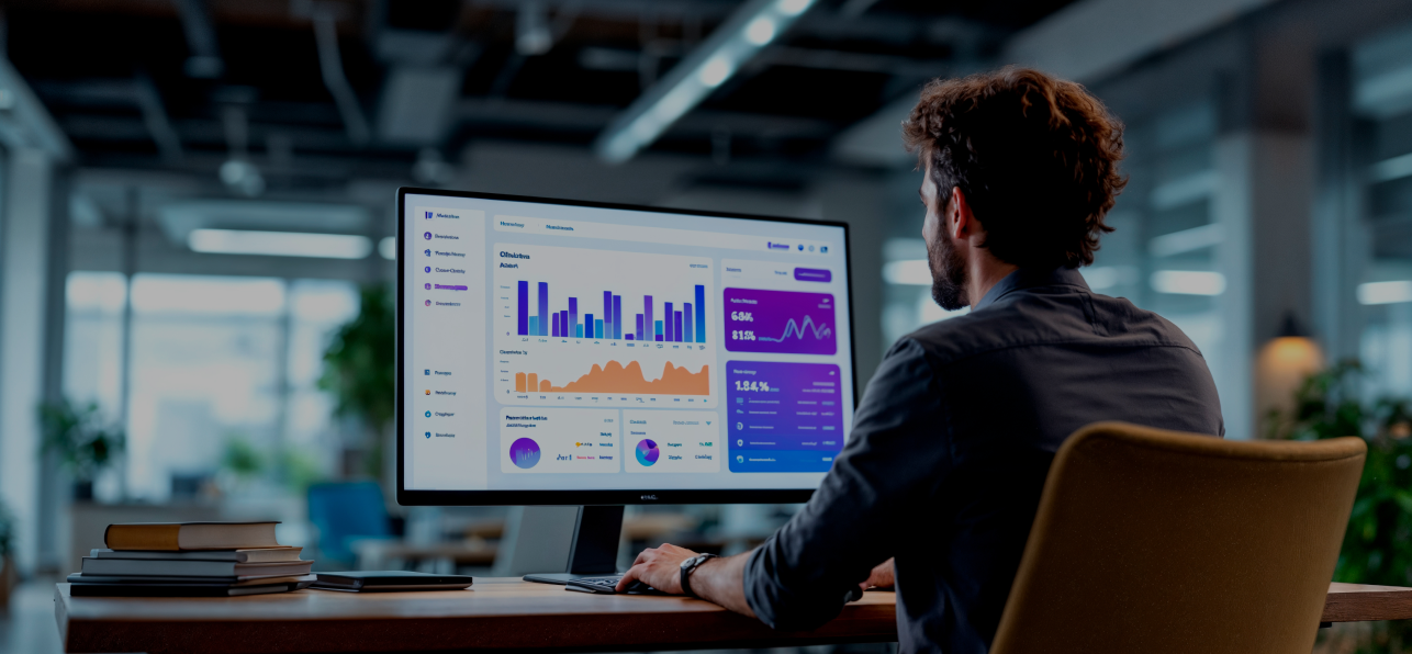 man_is_working_computer_with_graph_screen_1